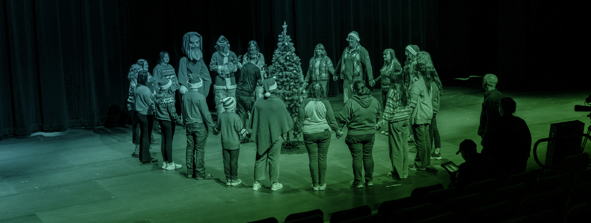 BSC Students and Staff Around Christmas Tree
