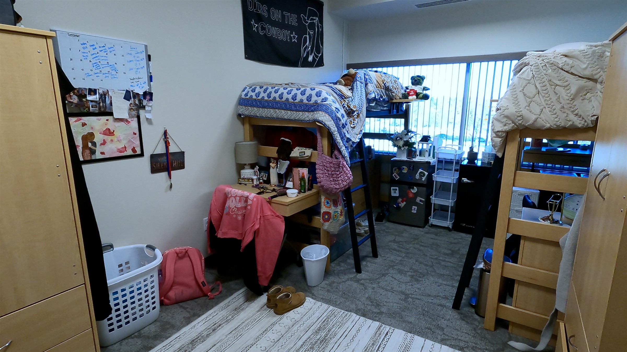 Interior of Health Science Hall dorm room with two beds and desk areas