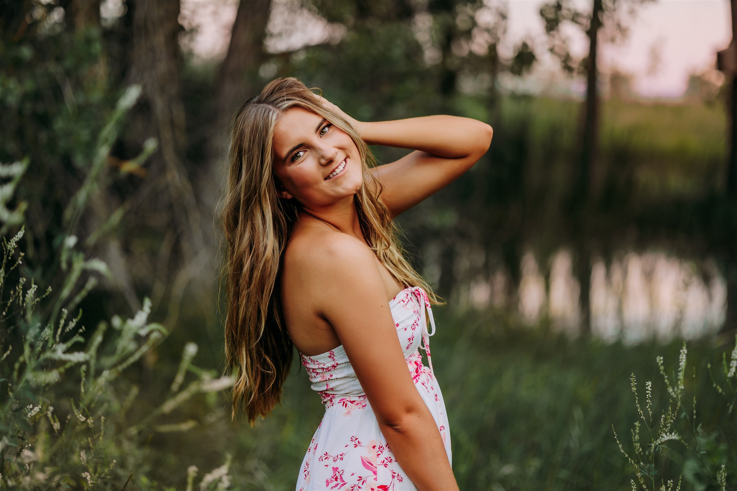 Girl in white dress in field 